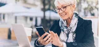 woman looks her phone